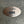 Copper plaque with 'DUKE Best Dog Ever' text on a gray surface
